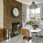 Park View Family Home, North London | Kitchen fireplace | Interior Designers